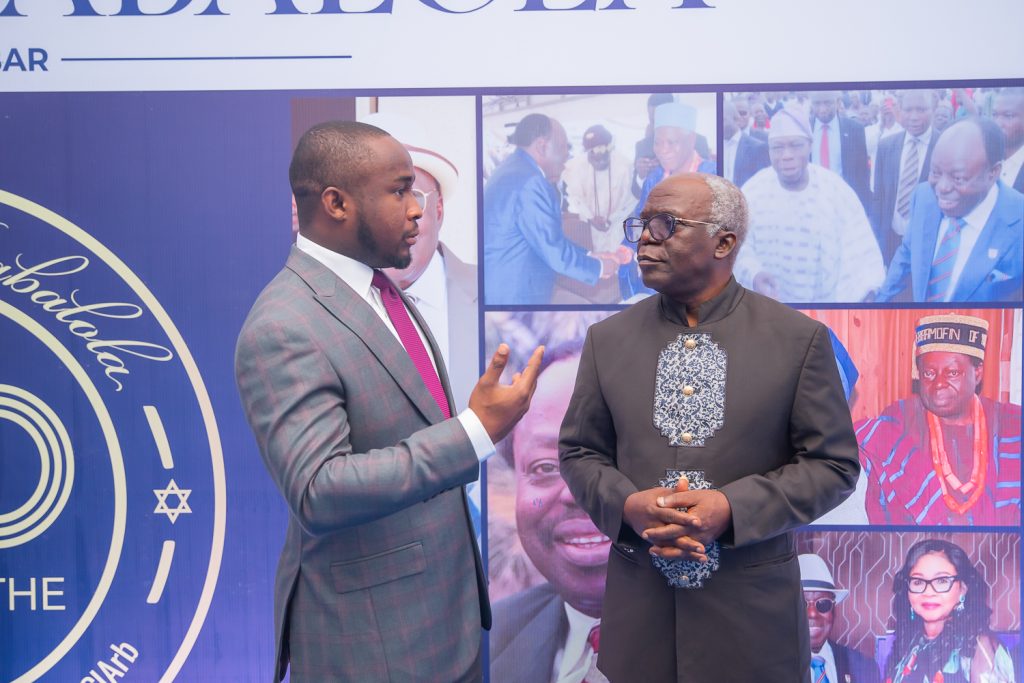 Mobolaji Oriola with Femi Falana, SAN.